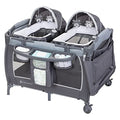 Twin Bassinet Rocker With Toys