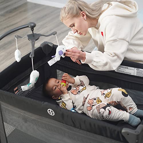 4 In 1 Portable Baby Crib And Nursery Center With Removable Canopy Changing Table Lockable Wheels Storage Bag