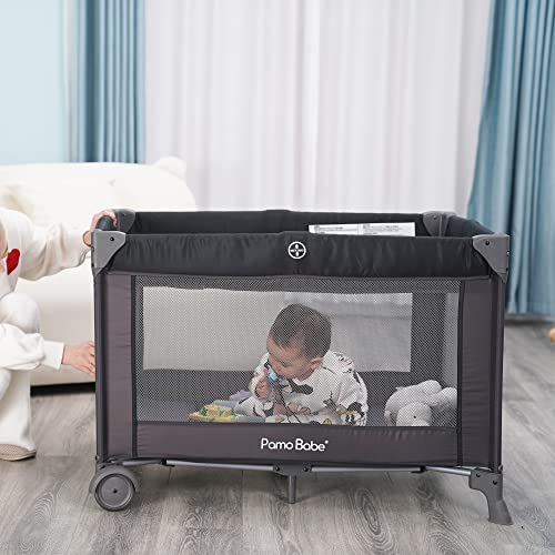4 In 1 Portable Baby Crib And Nursery Center With Removable Canopy Changing Table Lockable Wheels Storage Bag
