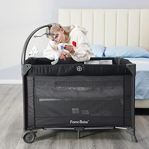 4 In 1 Portable Baby Crib And Nursery Center With Removable Canopy Changing Table Lockable Wheels Storage Bag